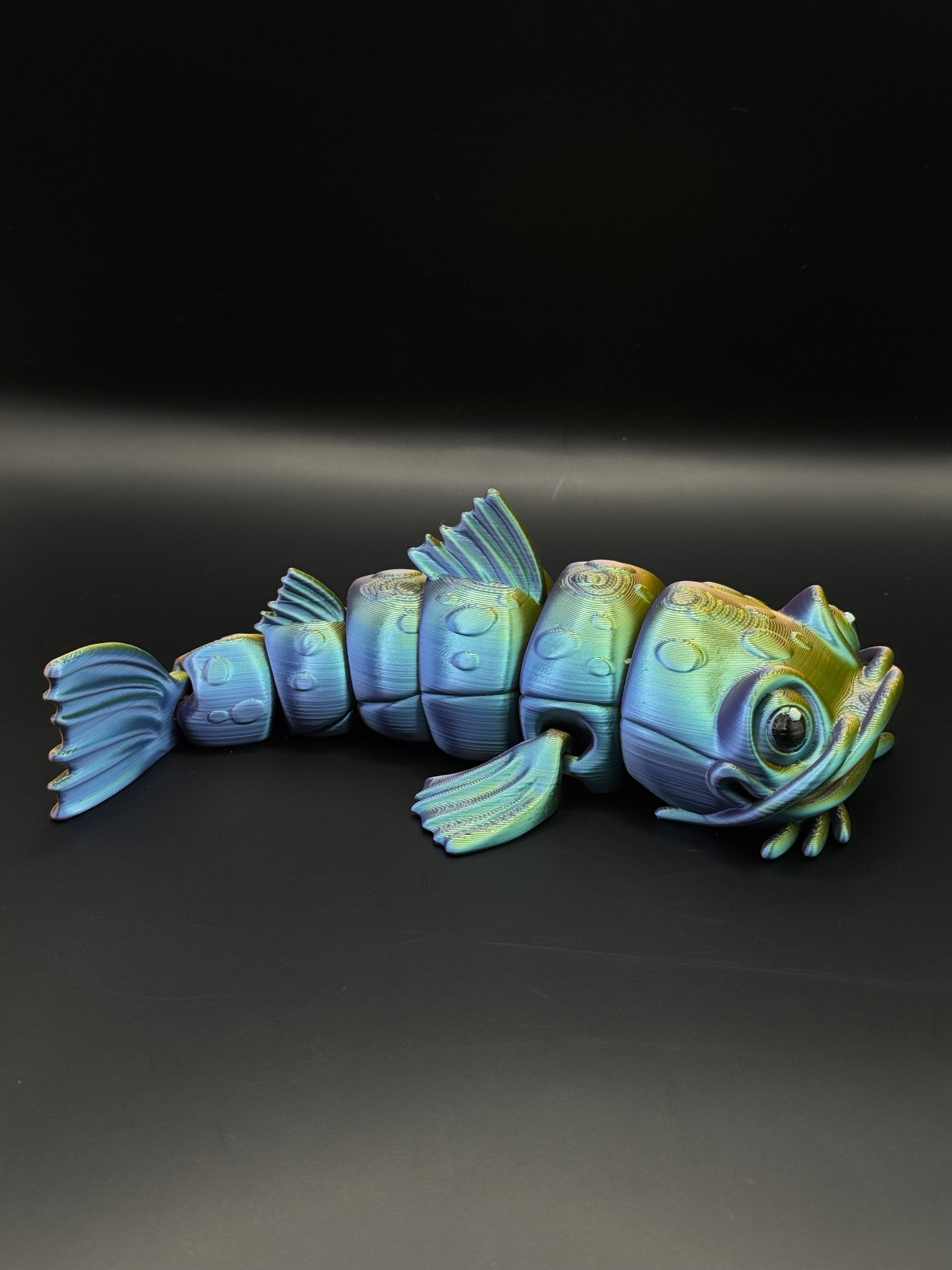 Magisk Ledad Fidget-fisk (The Catfish)